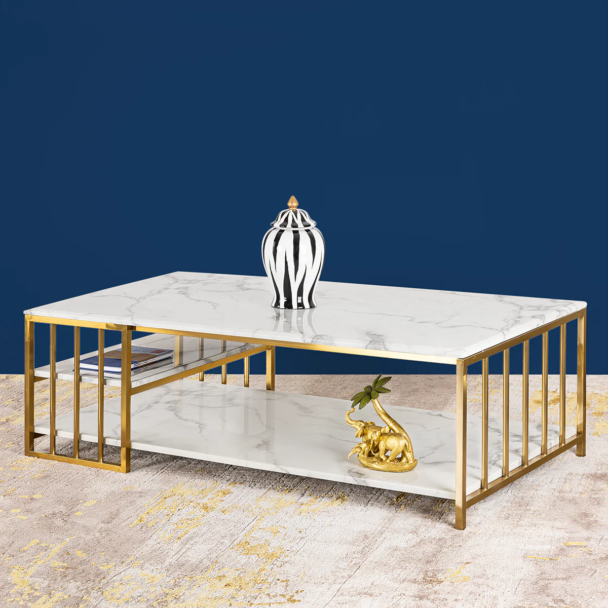 Anat LuxeStone White Marble Coffee Table Anat LuxeStone rectangular coffee table featuring a double-tier white marble design and a slatted gold-finish metal base. Luxury furniture available near Ambala, Haryana, and across India