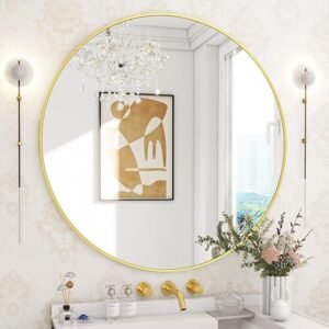 Anat Orbit large round wall mirror with a thin, minimalist gold metal frame, displayed over a bathroom vanity in a luxury setting. Designer mirror available near Ambala, Haryana, and across India.