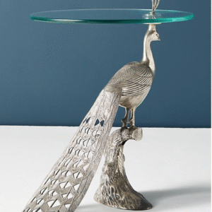 “Anat Pavona Designer Table – luxury peacock base side table with detailed metal sculpture and round glass top for premium home décor furniture”