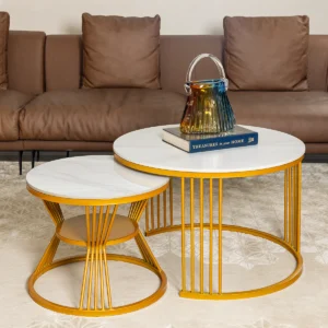 Set of two Anat Eclipse round nesting coffee tables with white marble-look tops and decorative gold metal slatted bases. Modern living room furniture available near Ambala, Haryana, and across India.
