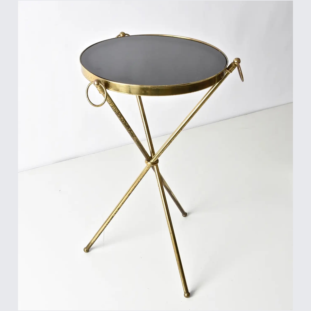 Anat Aura Arc Side Table – Metallic Round Accent Table” Anat Aura Arc Side Table – metallic round side table with black top and golden tripod legs”