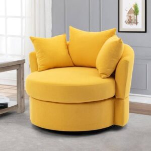 Oversized round yellow velvet swivel barrel accent chair with two matching throw pillows, perfect for cozy, modern living room or lounge seating.