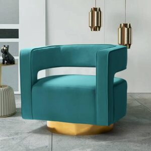 Teal blue velvet modern accent chair with a boxy, open-arm design and a gold brass-finish swivel base, ideal for luxury living rooms and office seating.